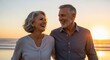 © AC's Inspired Images - Happy senior couple walking and laughing together on the beach at sunset, golden hour lighting, candid moment, warm tones, lifestyle photography style