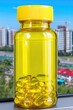 © Konstiantyn Zapylaie - Yellow pill bottle with omega-3 capsules against urban skyline background