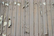 © Conrmiller - Peeling paint on wooden cladding