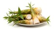 © Akibur  world  - Pile of fresh bamboo shoots on a plate isolated on white background