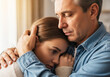 © Amazinglaive - Sad Daughter Hugging Her Father for Comfort and Support. Family Love and Care