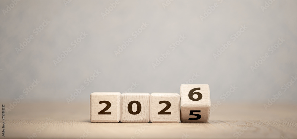Wooden cubes changing year 2025 to 2026 on neutral background Stock ...