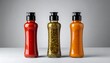 © punyapob - Three condiment bottles on a studio background identical