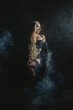 © Михаил Решетников - Long-haired blonde woman posing in lingerie.