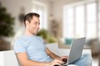 © BillionPhotos.com - Happy business man working at home in living room