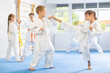 © JackF - Young children partners pupils are trained to perform defensive karate installations and attacking actions for combat techniques classes. Work on yourself, increase endurance, determination, courage