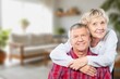 © BillionPhotos.com - Hug, love of senior couple relaxing together at home.