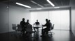 © Marco Mamdouh - Blurred Silhouette Meeting Teamwork Business Strategy Corporate Office Collaboration Discussion Leadership Concept