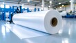 © Anas - Rolls of plastic film in an industrial factory setting for packaging and industry.