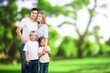 © BillionPhotos.com - Happy young family walking in the park