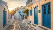 © Rakib - Picturesque street in mykonos, greece at sunset with white and blue houses