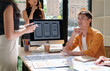 © crizzystudio - Team collaborating on mobile application ui ux design