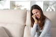 © Antonioguillem - Woman complaining scratching eye at home