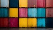 © Thares2020 - A dense stack of vibrantly colored shipping containers showcasing a spectrum of hues arranged in an organized industrial setting