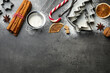 © New Africa - Christmas composition with rolling pin, cookie cutters and spices on grey table, flat lay. Space for text