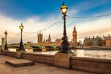 Historic lamps along the South Bank promenade in London UK