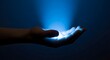 © Wool World - Bright blue light in a hand, symbolizing science's role in healthy living and future well-being, driving innovation and human progress