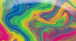 © themondunee - Iridescent liquid swirl of rainbow colors with small bubbles