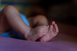 © Pantelis - A close-up photo of a baby’s tiny feet resting gently on a soft surface.  Ideal for concepts related to family, parenting, newborn care, love, and the beauty of simple moments.