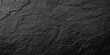 © Nan Shen - black concrete wall , grunge stone texture , dark gray rock surface background panoramic wide banner