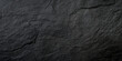 © Nan Shen - black concrete wall , grunge stone texture , dark gray rock surface background panoramic wide banner
