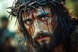 © btiger - intense close-up of a man with long hair and beard wearing a crown of thorns with blood streaming down his forehead and face