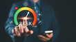 © Nirusmee - Risk assessment and management performance indicator gauge. Risk level gauge from low to high, performance evaluation, analysis, strategic planning, and decision making process for business continuity