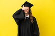 © luismolinero - Middle aged university graduate isolated on yellow background covering eyes by hands. Do not want to see something