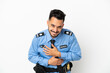 © luismolinero - Police caucasian man isolated on white background smiling a lot