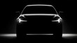 © FauziNh - Sleek, modern automobile silhouette emerges from darkness, illuminated by headlights