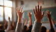 © Tetiana - Students In A Middle School Classroom Are Seen Raising Their Hands To Participate In The Lesson Being Taught By The Teacher.
