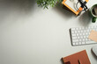 © Prathankarnpap - Minimalist top view workspace desk with computer, notebook, coffee