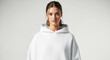 © ColdFire - Young caucasian female wearing a white hoodie, with hair tied back, facing forward with a neutral expression.