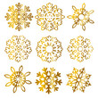 © Aqvarelka - Golden and white ornate snowflakes set - intricate winter designs.