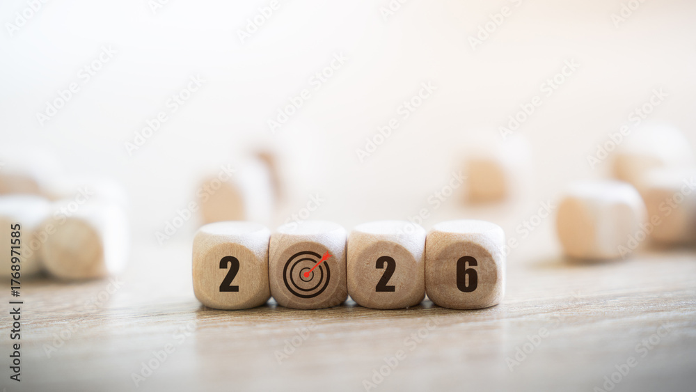 Transition from 2025 to 2026 with wooden blocks. Business goals for the ...