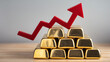 © Mike Stock - Financial success and wealth growth symbolized by gold bars and rising arrow.