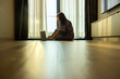© shine - Moving, relocation and New home concept - Happy young woman sitting with laptop on floor at new apartment, imagining interior design, planning flat decoration after moving to own apartment. Copy space