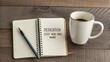 © ARBA - Spiral Notebook With Dedication Message Beside Coffee Mug