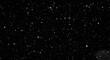 © graphiczone872 - Abstract background of white particles or dust floating in the dark