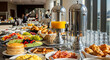 © Gabriel - Ultra-realistic American hotel breakfast buffet with pancakes, scrambled eggs, bacon, sausages, pastries, fruits, and orange juice dispensers, modern dining hall filled with natural sunlight and warm