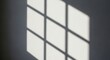 © Zahidul Creative - Geometric shadow pattern cast by a window pane on a plain surface isolated on white background
