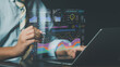 © ART STOCK CREATIVE - ิิbusiness professional analyzing financial data on laptop, holographic charts AI-driven dashboard, represent fintech innovation, digital transformation, smart investment strategy in modern economy.