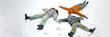 © Seventyfour - Header of family of parents and kid lying on snow creating snow angels, arms and legs spread wide, winter clothing visible, overhead view capturing playful outdoor winter activity together