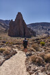 © Xalanx - Hiker approaching Ucanca rock in Roques de Garcia