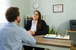 © AntonioDiaz - Female lawyer advising client during legal consultation