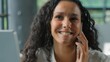 © Yuliia - Hispanic ethnic business woman talking mobile phone call businesswoman talk calling consulting female communicate conversation working in office job work negotiation with telephone manager worker