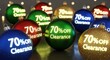 © Sikandar - Christmas ornaments with 70 off clearance text on a dark background