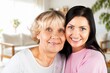 © BillionPhotos.com - Joyful happy woman embraces mother celebrating