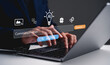 © Rawat - A person using a laptop with a virtual interface featuring AI icons and a command prompt, suggesting an interaction with technology and artificial intelligence.