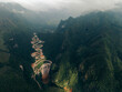 © Connect Images - Aerial view of a winding road cutting through lush green mountains under a cloudy sky. Khau Coc Cha Mountain Pass, Bao Lac, Cao Bang, Vietnam